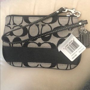 NWT Coach black/white wristlet